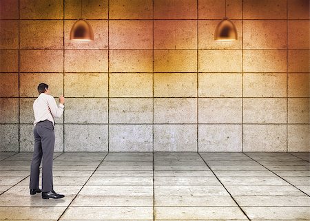 simsearch:6109-07601648,k - Thinking businessman holding pen against grey grid room with lights Foto de stock - Super Valor sin royalties y Suscripción, Código: 400-07448267