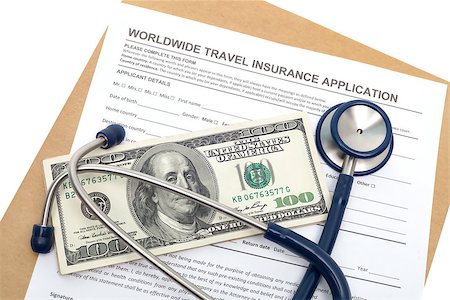International travel medical insurance application with stethoscope and money Stock Photo - Budget Royalty-Free & Subscription, Code: 400-07449035