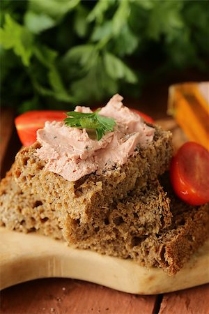 dinner spread - gourmet liver pate with black rye bread rustic style Stock Photo - Budget Royalty-Free & Subscription, Code: 400-07449164