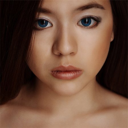 asian girl portrait with big lips and blue eyes Stock Photo - Budget Royalty-Free & Subscription, Code: 400-07449752