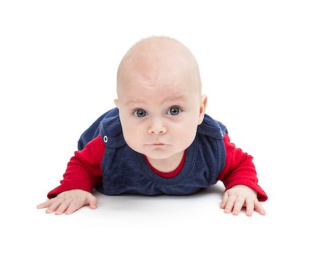 crawling baby looking into camera. isolated on white background Foto de stock - Royalty-Free Super Valor e Assinatura, Número: 400-07450362
