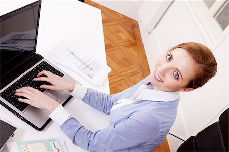 simsearch:400-08153344,k - young successful business woman working on computer in office Foto de stock - Super Valor sin royalties y Suscripción, Código: 400-07464810