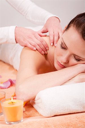 young attractive woman doing wellness spa relaxing massage Foto de stock - Super Valor sin royalties y Suscripción, Código: 400-07465003