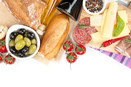 simsearch:400-07481818,k - Cheese, prosciutto, bread, vegetables and spices. Isolated on white background with copy space Foto de stock - Super Valor sin royalties y Suscripción, Código: 400-07465269