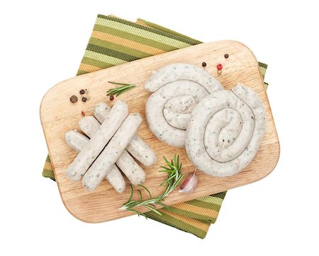 simsearch:825-02307332,k - Raw sausages with spices. Isolated on white background Stockbilder - Microstock & Abonnement, Bildnummer: 400-07465280