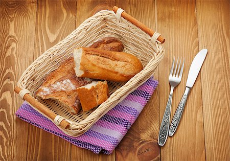 simsearch:400-04699541,k - Homemade french bread over wooden table background Foto de stock - Super Valor sin royalties y Suscripción, Código: 400-07465294