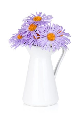 simsearch:400-07179442,k - Blue camomile flowers in jug. Isolated on white background Stock Photo - Budget Royalty-Free & Subscription, Code: 400-07465314