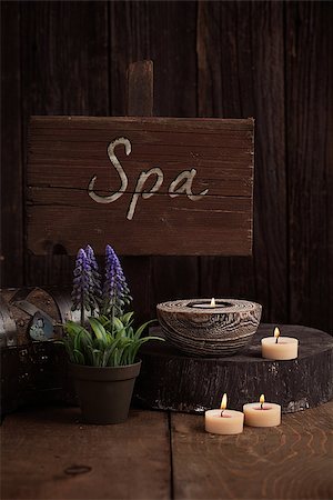 simsearch:400-05902613,k - Spa and wellness setting with natural soap, candles and towel. Wooden dayspa nature setting Foto de stock - Royalty-Free Super Valor e Assinatura, Número: 400-07465840