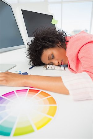 simsearch:400-07466593,k - Side view of a female artist with head resting on keyboard in the office Stock Photo - Budget Royalty-Free & Subscription, Code: 400-07466499