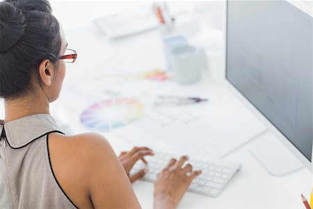 Designer working on her computer in creative office Stock Photo - Budget Royalty-Free & Subscription, Code: 400-07466916