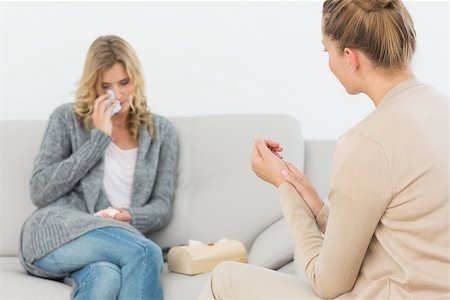 psychology couch - Therapist listening to crying patient on the sofa at therapy session Stock Photo - Budget Royalty-Free & Subscription, Code: 400-07467006