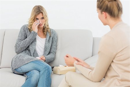 simsearch:6109-08203204,k - Therapist talking to crying patient on the sofa at therapy session Stock Photo - Budget Royalty-Free & Subscription, Code: 400-07467007