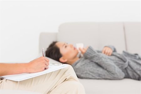 simsearch:400-06932773,k - Therapist taking notes on her crying patient on the sofa at therapy session Stock Photo - Budget Royalty-Free & Subscription, Code: 400-07467016
