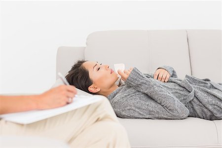 simsearch:400-06932773,k - Therapist taking notes on her crying patient on the couch at therapy session Stock Photo - Budget Royalty-Free & Subscription, Code: 400-07467017