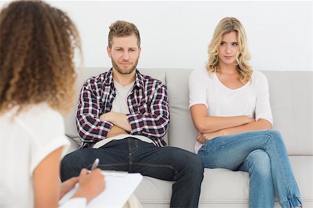 Unhappy couple not talking on the couch at therapy session Stock Photo - Budget Royalty-Free & Subscription, Code: 400-07467029