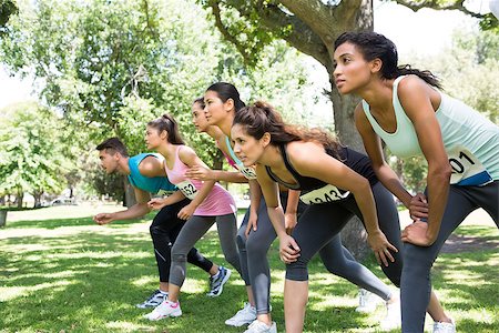 runner women group - Group of marathon runners preparing for a race in the park Stock Photo - Budget Royalty-Free & Subscription, Code: 400-07467546