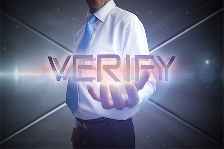 simsearch:6109-07601741,k - Businessman presenting the word verify against futuristic screen with lines Photographie de stock - Aubaine LD & Abonnement, Code: 400-07469263