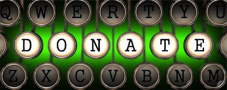 Donate Concept on Old Typewriter's Keys on Green Background. Photographie de stock - Aubaine LD & Abonnement, Code: 400-07461784