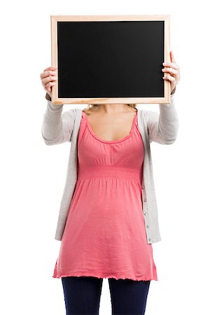 Beautiful woman holding  a chalkboard, isolated over white background Stock Photo - Budget Royalty-Free & Subscription, Code: 400-07463001