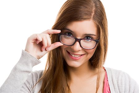 Beautiful and attractive blonde woman wearing glasses, isolated over white background Photographie de stock - Aubaine LD & Abonnement, Code: 400-07463002