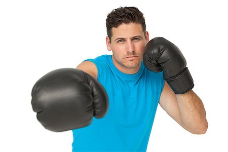 simsearch:400-07143098,k - Determined male boxer focused on his training over white background Stock Photo - Budget Royalty-Free & Subscription, Code: 400-07475598