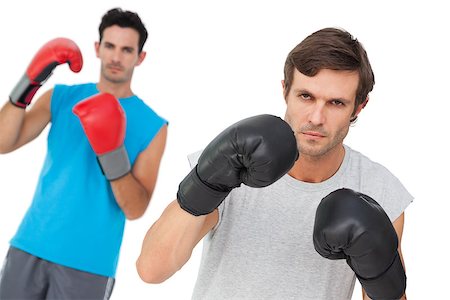 simsearch:400-07143098,k - Portrait of two male boxers practicing over white background Stock Photo - Budget Royalty-Free & Subscription, Code: 400-07475730