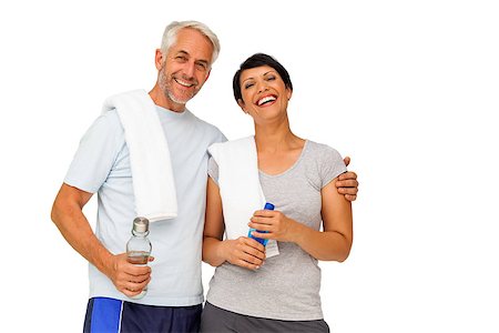 exercise for women over 50 years old - Portrait of a happy fit couple standing over white background Stock Photo - Budget Royalty-Free & Subscription, Code: 400-07476258