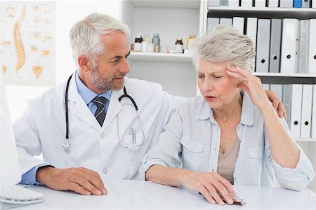 Female senior patient visiting a doctor at the medical office Stock Photo - Budget Royalty-Free & Subscription, Code: 400-07476399