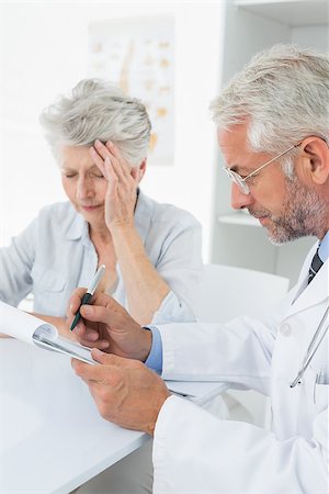 Female senior patient visiting a doctor at the medical office Stock Photo - Budget Royalty-Free & Subscription, Code: 400-07476416