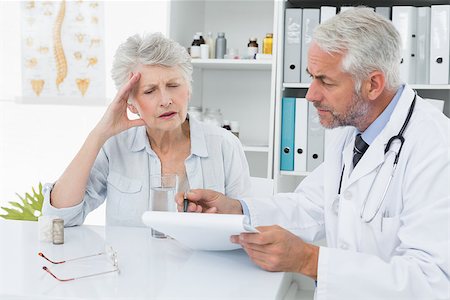 Female senior patient visiting a doctor at the medical office Stock Photo - Budget Royalty-Free & Subscription, Code: 400-07476418