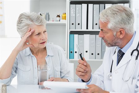 Female senior patient visiting a doctor at the medical office Stock Photo - Budget Royalty-Free & Subscription, Code: 400-07476419