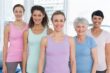 senior woman yoga class - Portrait of smiling women standing in the yoga class Stock Photo - Budget Royalty-Free & Subscription, Code: 400-07476690