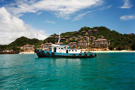 philippine fishing boat pictures - Traditional Philippine boat in a gulf. Island Boracay Stock Photo - Budget Royalty-Free & Subscription, Code: 400-07477407
