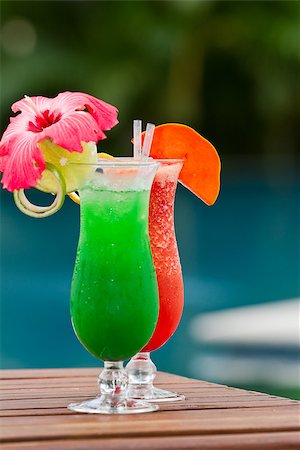 simsearch:400-06797125,k - fresh tropical juice cocktail served pool side in Belize Stock Photo - Budget Royalty-Free & Subscription, Code: 400-07477810