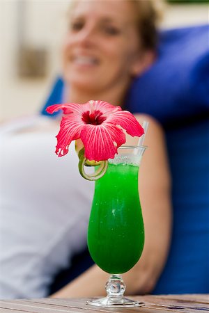 simsearch:400-06797125,k - fresh tropical juice cocktail served pool side in Belize Stock Photo - Budget Royalty-Free & Subscription, Code: 400-07477811