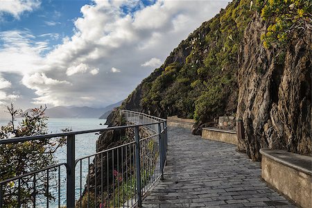 Cinque Terre - road of love. Liguria, Italy.One from most beautiful in Italy of for pedestrians paths for lover Foto de stock - Super Valor sin royalties y Suscripción, Código: 400-07478301