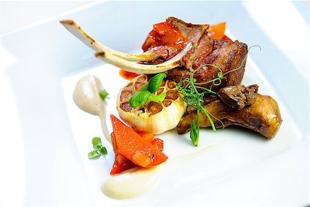 Juicy lamb steak on a plate close-up Stock Photo - Budget Royalty-Free & Subscription, Code: 400-07478927