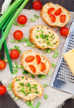simsearch:400-08014878,k - Delicious bruschetta with cherry tomatoes and scallion Stock Photo - Budget Royalty-Free & Subscription, Code: 400-07479099