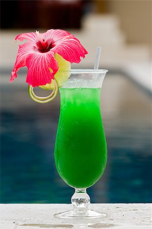 simsearch:400-06797125,k - fresh tropical juice cocktail served pool side in Belize Stock Photo - Budget Royalty-Free & Subscription, Code: 400-07479284