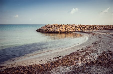 little lagoon with fisherman in the morning in Mahdia, Tunisia Stock Photo - Budget Royalty-Free & Subscription, Code: 400-07479550