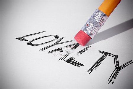 simsearch:400-07470030,k - Pencil erasing the word loyalty on paper Stock Photo - Budget Royalty-Free & Subscription, Code: 400-07470045