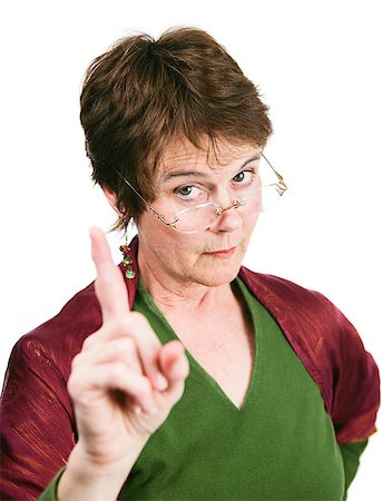 rheumatoid arthritis - Bossy looking middle-aged woman wagging her finger in disapproval.  Isolated on white. Stock Photo - Budget Royalty-Free & Subscription, Code: 400-07470463