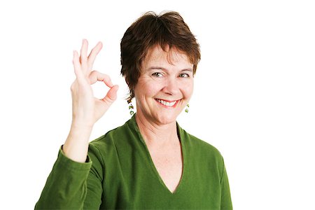 rheumatoid arthritis - Pretty mature Irish woman making the Okay sign with her hands.  Isolated on white. Stock Photo - Budget Royalty-Free & Subscription, Code: 400-07470475