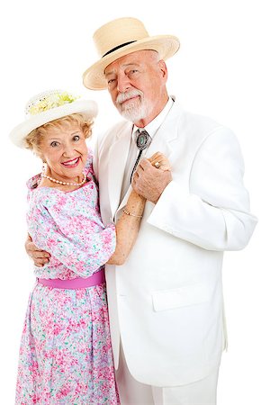 simsearch:400-08040653,k - Loving senior couple in Southern style clothing dancing together.  White background. Stock Photo - Budget Royalty-Free & Subscription, Code: 400-07470472