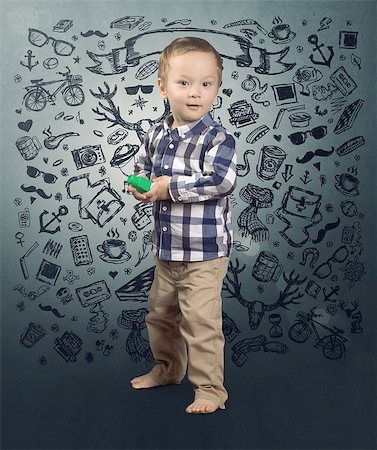 simsearch:400-08415463,k - Hipster baby boy with toys in his hands Stock Photo - Budget Royalty-Free & Subscription, Code: 400-07470901