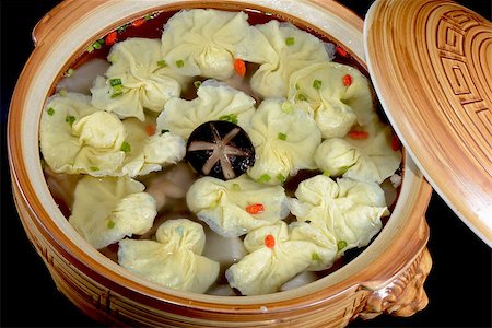 Chinese Food:  Boiled dumplings in a clay pot Stock Photo - Budget Royalty-Free & Subscription, Code: 400-07470964