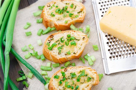 simsearch:400-08014878,k - Delicious baked bruschetta with cheese and scallion Stock Photo - Budget Royalty-Free & Subscription, Code: 400-07471278