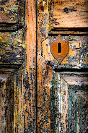 simsearch:400-04955795,k - Detail of vintage key hole on weathered wooden door Stock Photo - Budget Royalty-Free & Subscription, Code: 400-07472334