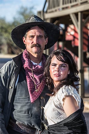 simsearch:400-07516134,k - Portrait of an old west woman and sheriff Photographie de stock - Aubaine LD & Abonnement, Code: 400-07472628