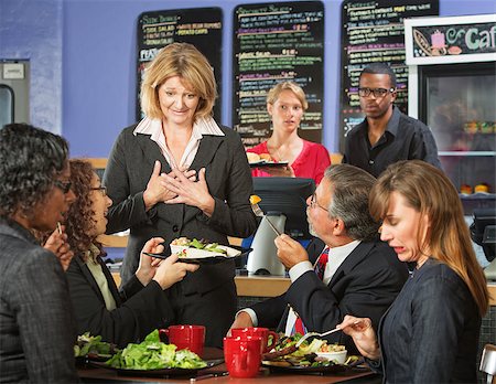 Ashamed coffee house owner with disgusted customers Stock Photo - Budget Royalty-Free & Subscription, Code: 400-07472622
